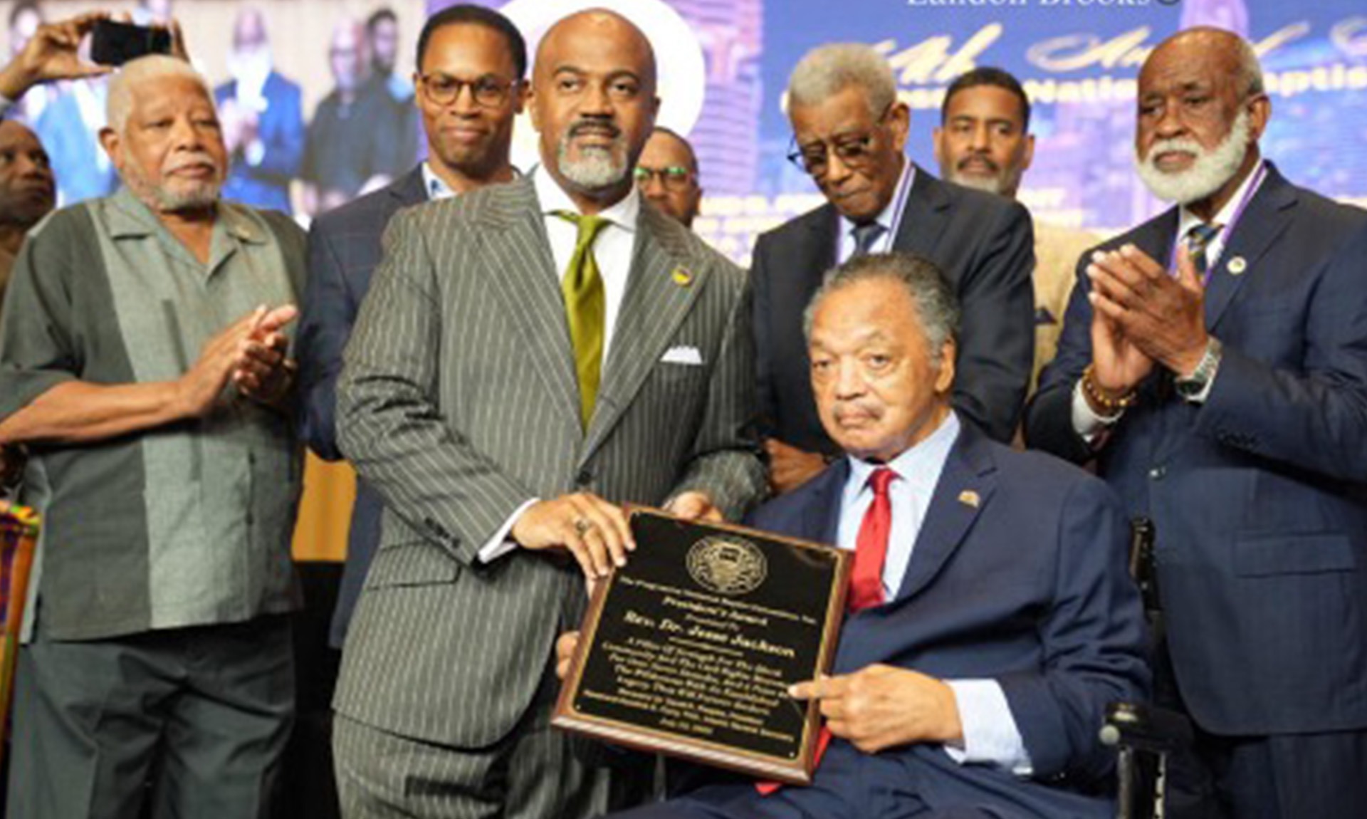 Rev. Jesse Jackson receives the PNBC President’s Award on stage