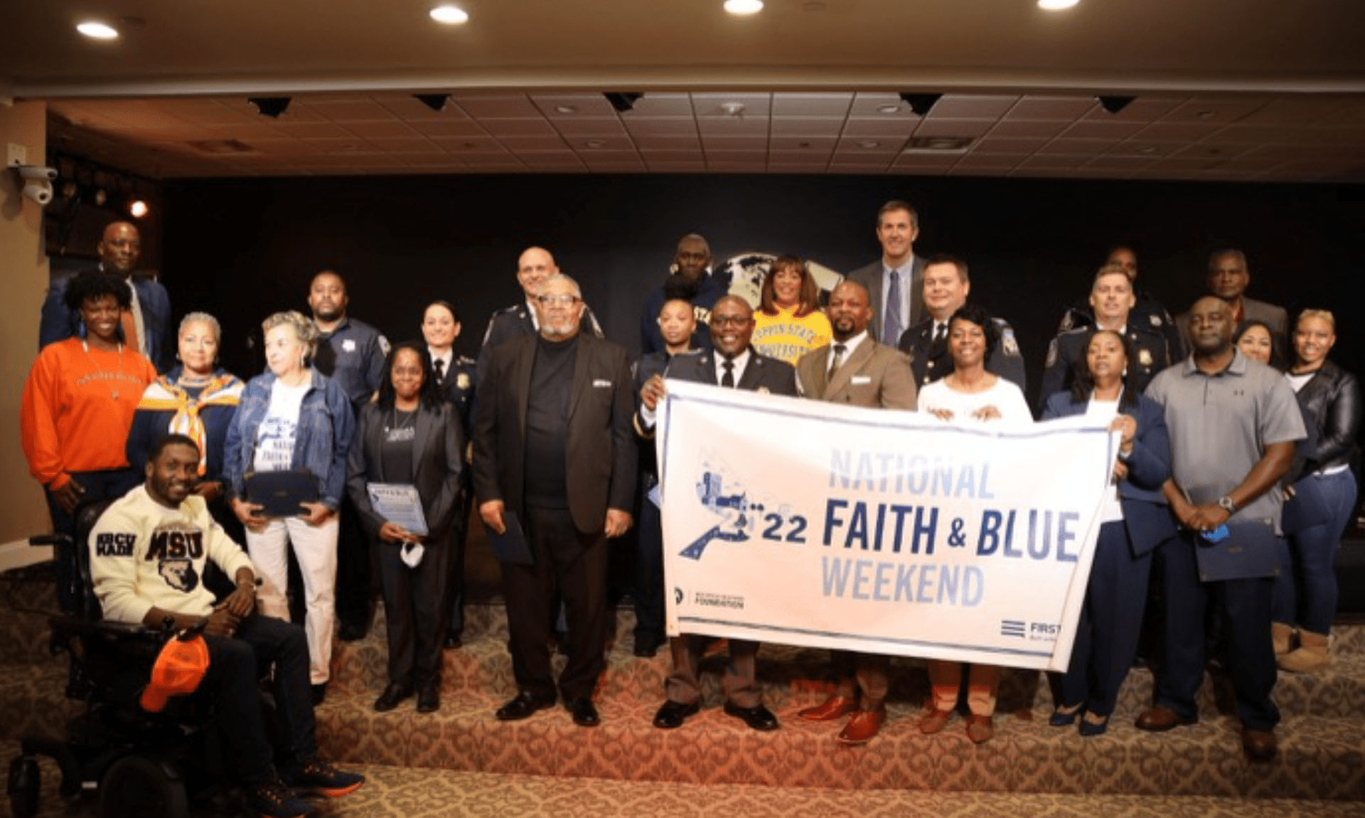 Police officers and church members share conversation and fellowship during Faith & Blue Sunday, bridging the Black-Blue divide.