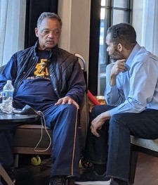 Jesse Jackson with his son during caregiving moments