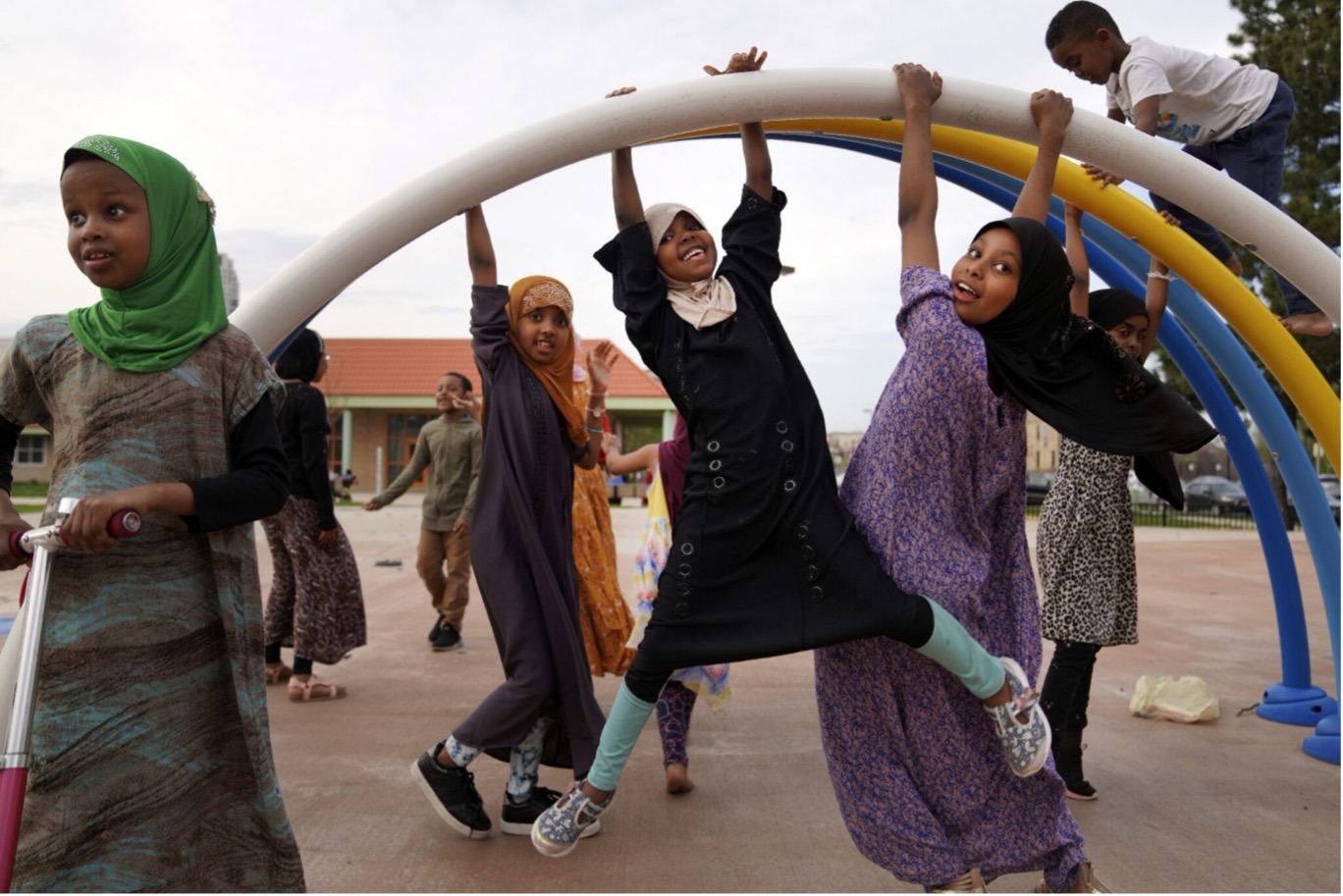 Somali children play at a community park in the Cedar-Riverside neighborhood of Minneapolis, reflecting resilience, joy, and everyday life in Somali American communities.