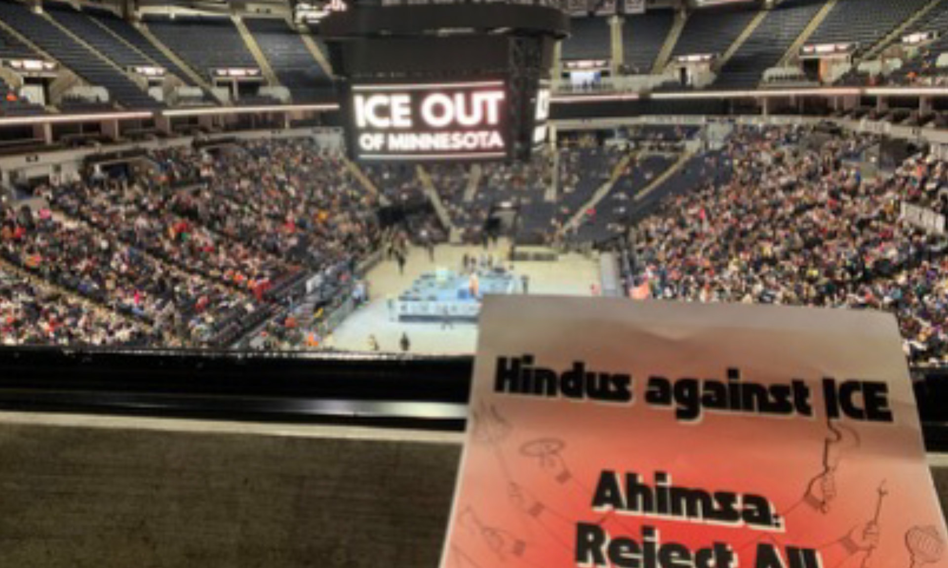 Thousands of people attend a rally at the Target Center after a large march in Minneapolis.