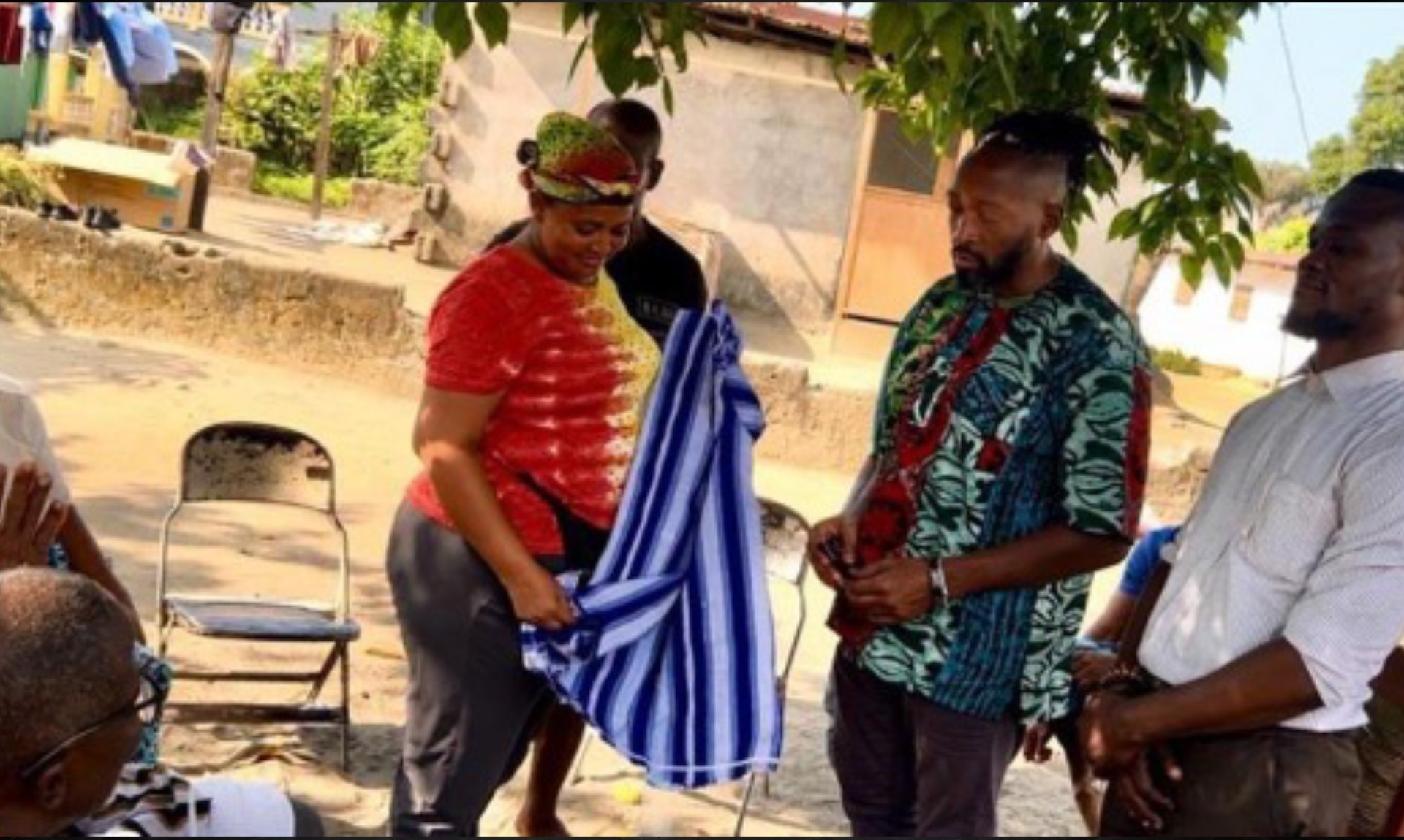 Indigenous Liberian elders welcome the Rev. Jermaine Ross-Allam during Project 180 work on the Presbyterian colonial legacy in Liberia